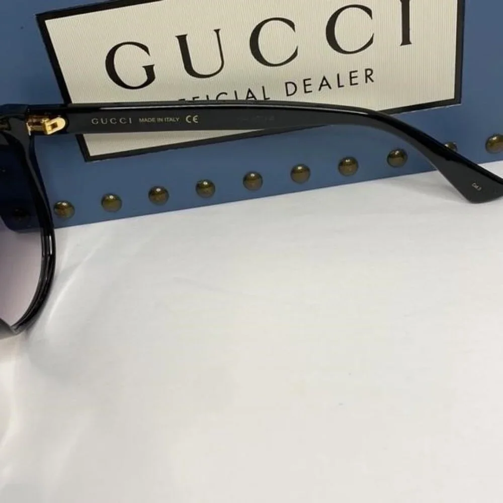 GUCCI GG0631S 001 round sunglass comes black frame with grey gradient lenses